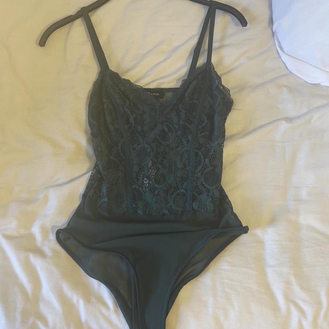 Emerald green lace bodysuit in size 10. Only worn... - Depop