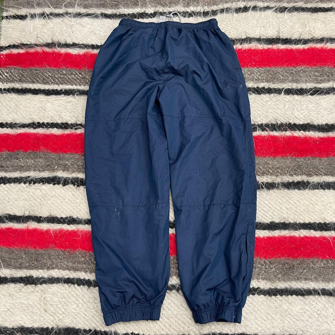 nike navy tracksuit bottoms