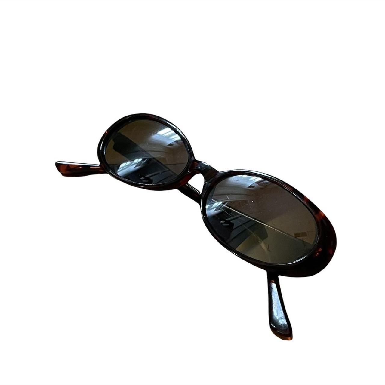 Product Image 1 - vintage oval sunglasses
no brand visible
model