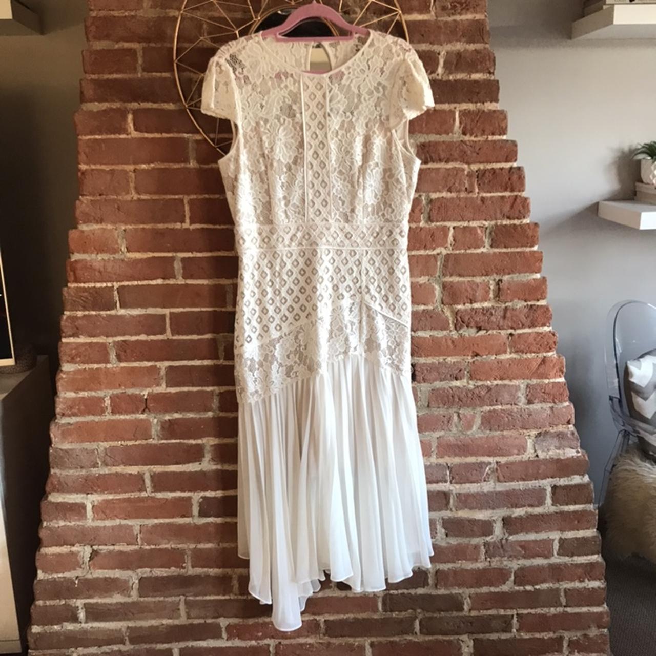 Stunning white lace dress with pleat detail from... - Depop