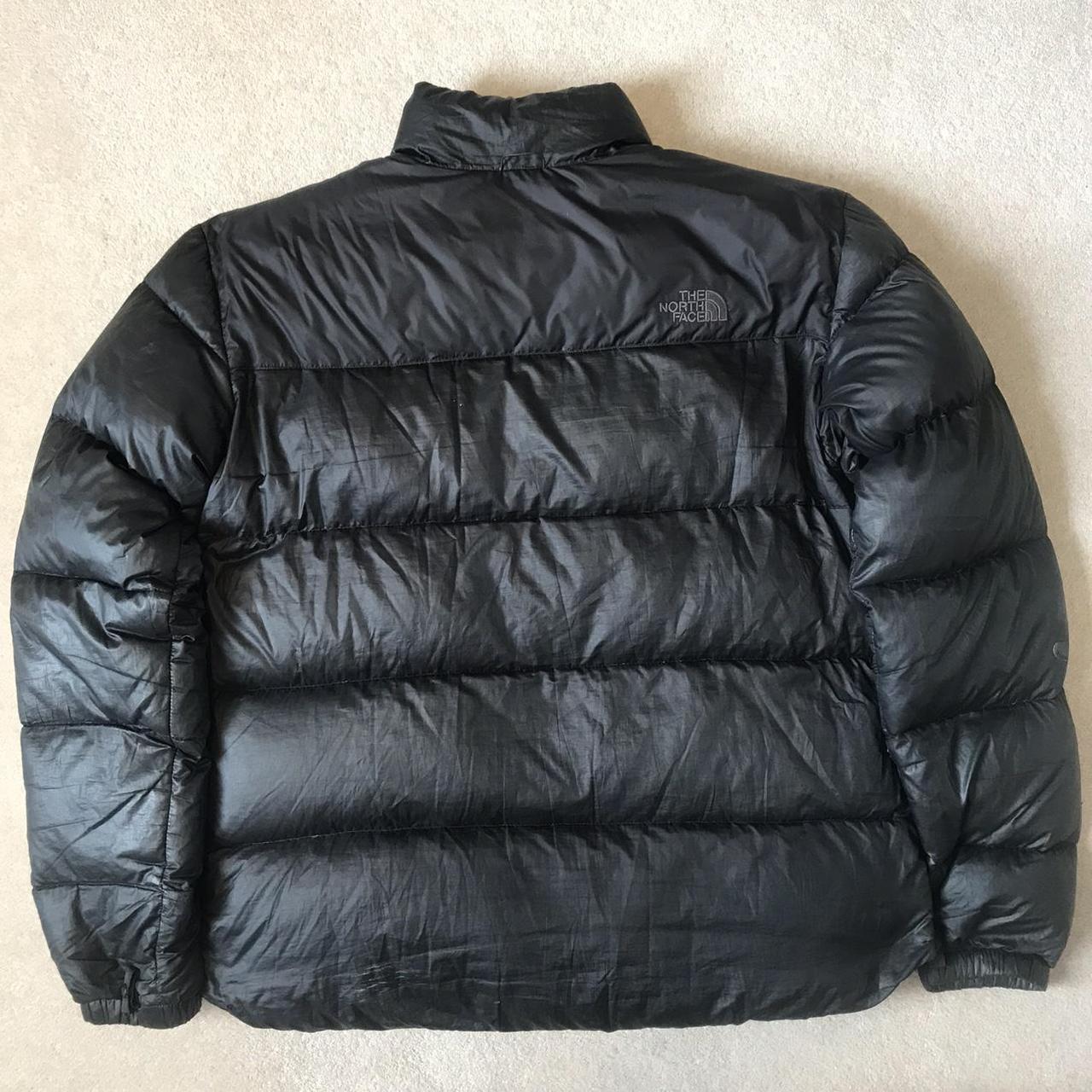Black North Face puffer jacket 700 with zip pockets... - Depop