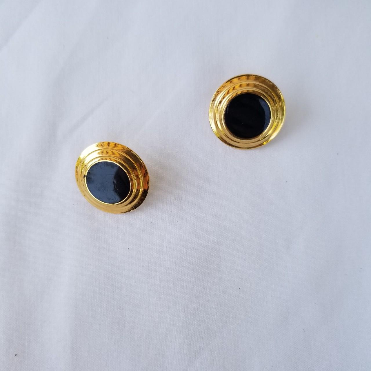 Beautiful classy black and gold colored stud... - Depop