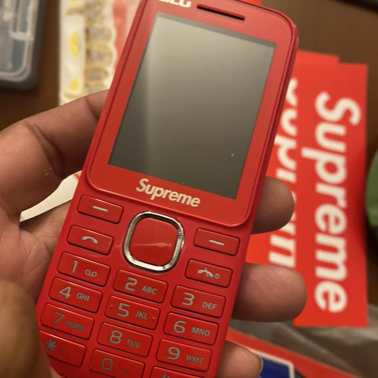 Supreme blu store burner phone red