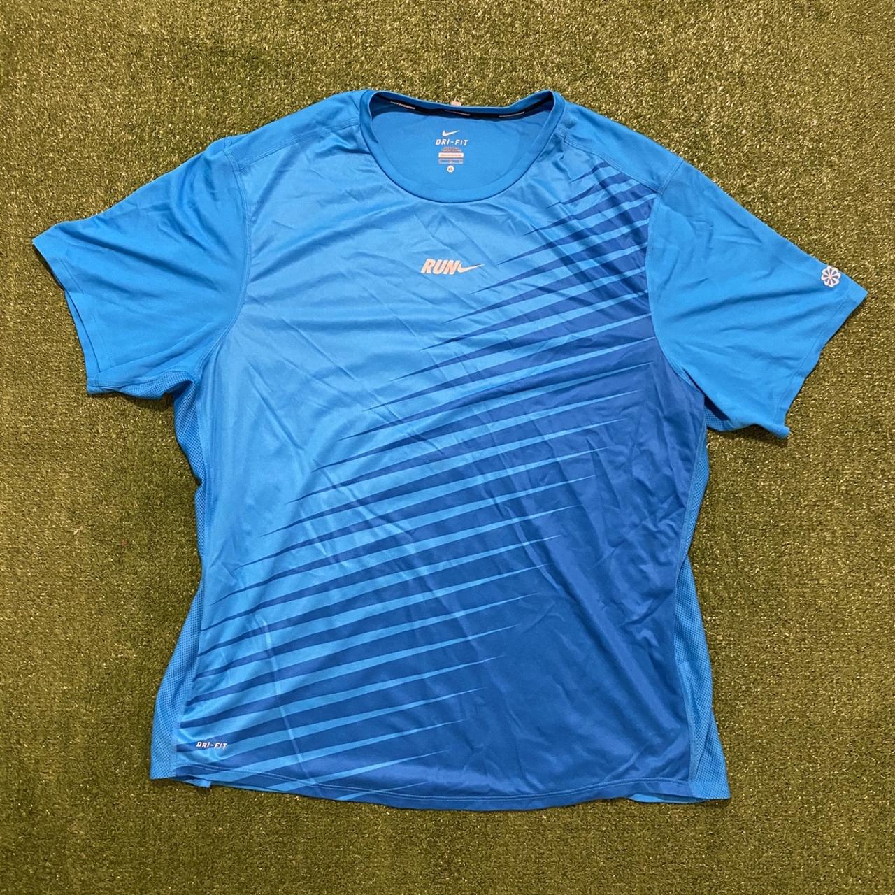 Nike Dri Fit Run Running Blue Tight Fit Shirt Top.... Depop