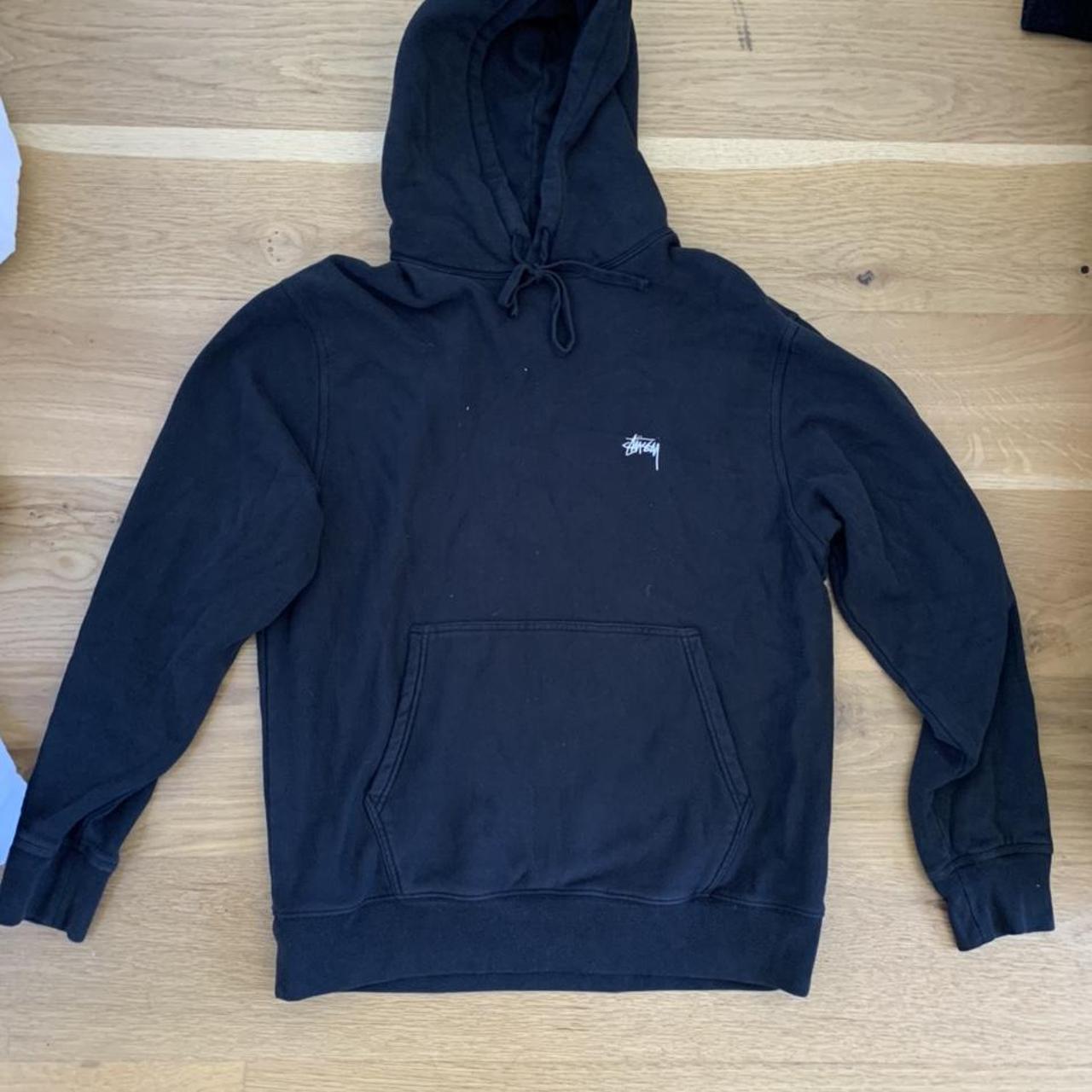Stock black stussy hoodie. Goes with pretty much... - Depop