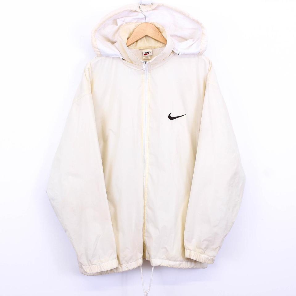 gold and white nike windbreaker