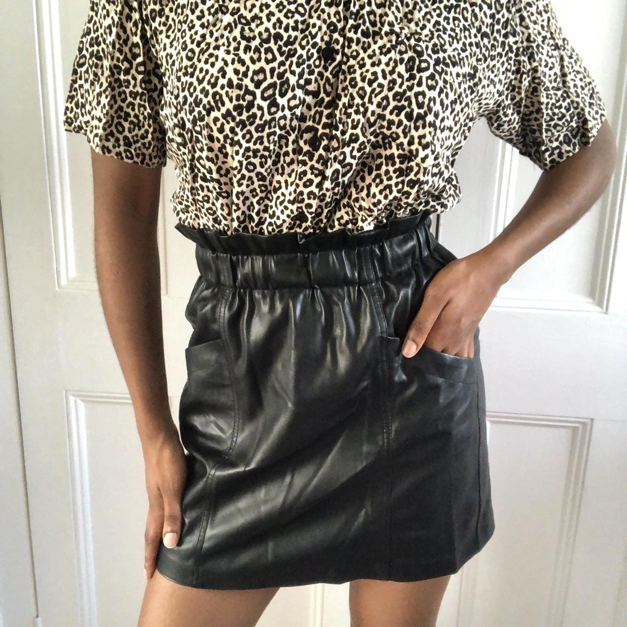 Faux leather black mini skirt with elasticated waist. Depop