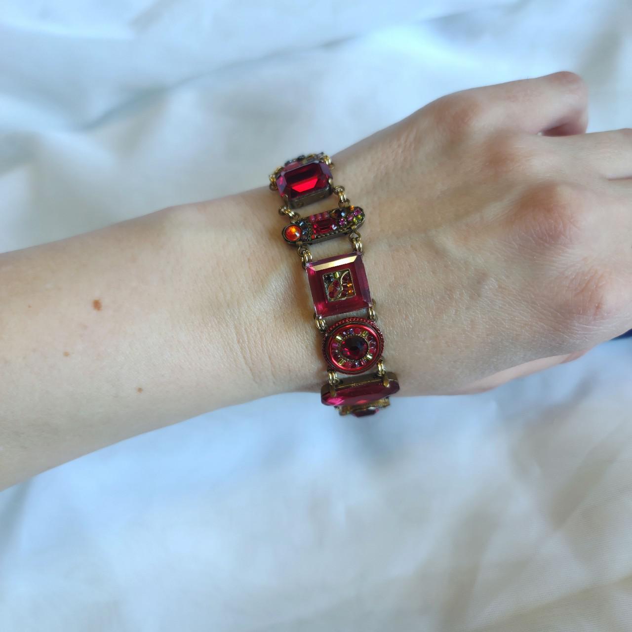 Early 2000s red and gold faux gemstone bracelet.... Depop