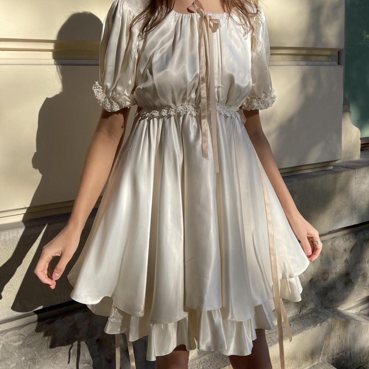 Beautiful and angelic lace dress. Bows, details,... - Depop