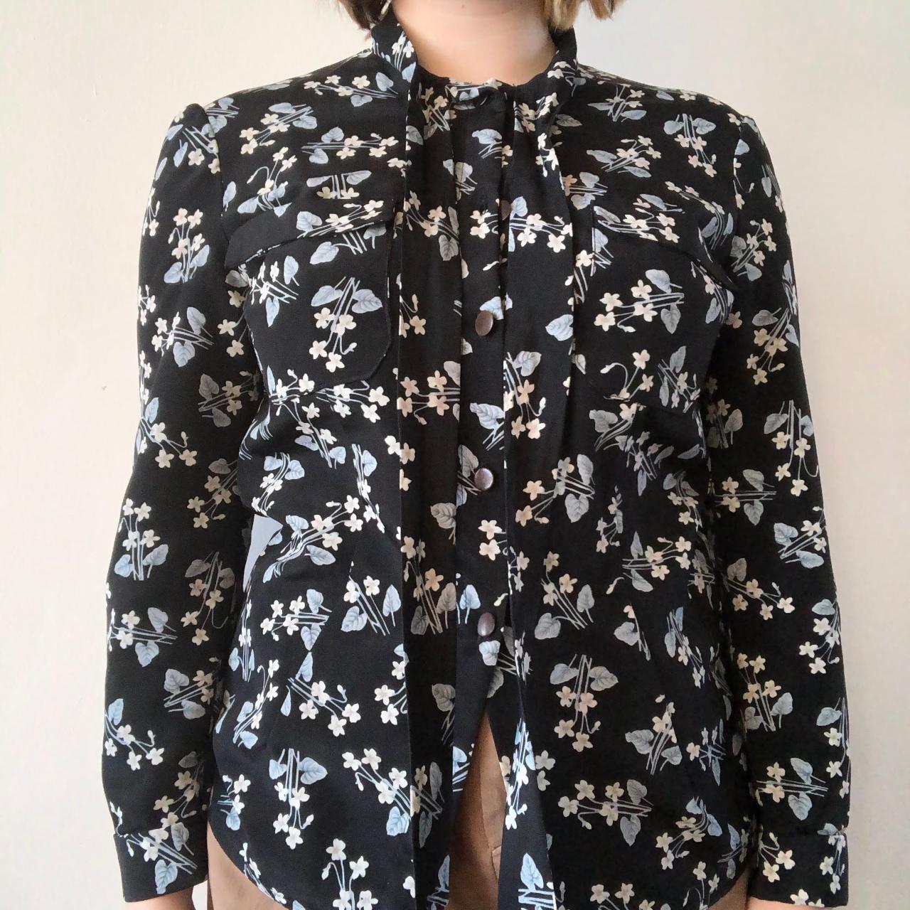 Floral black tie neck blouse with balloon sleeves.... - Depop