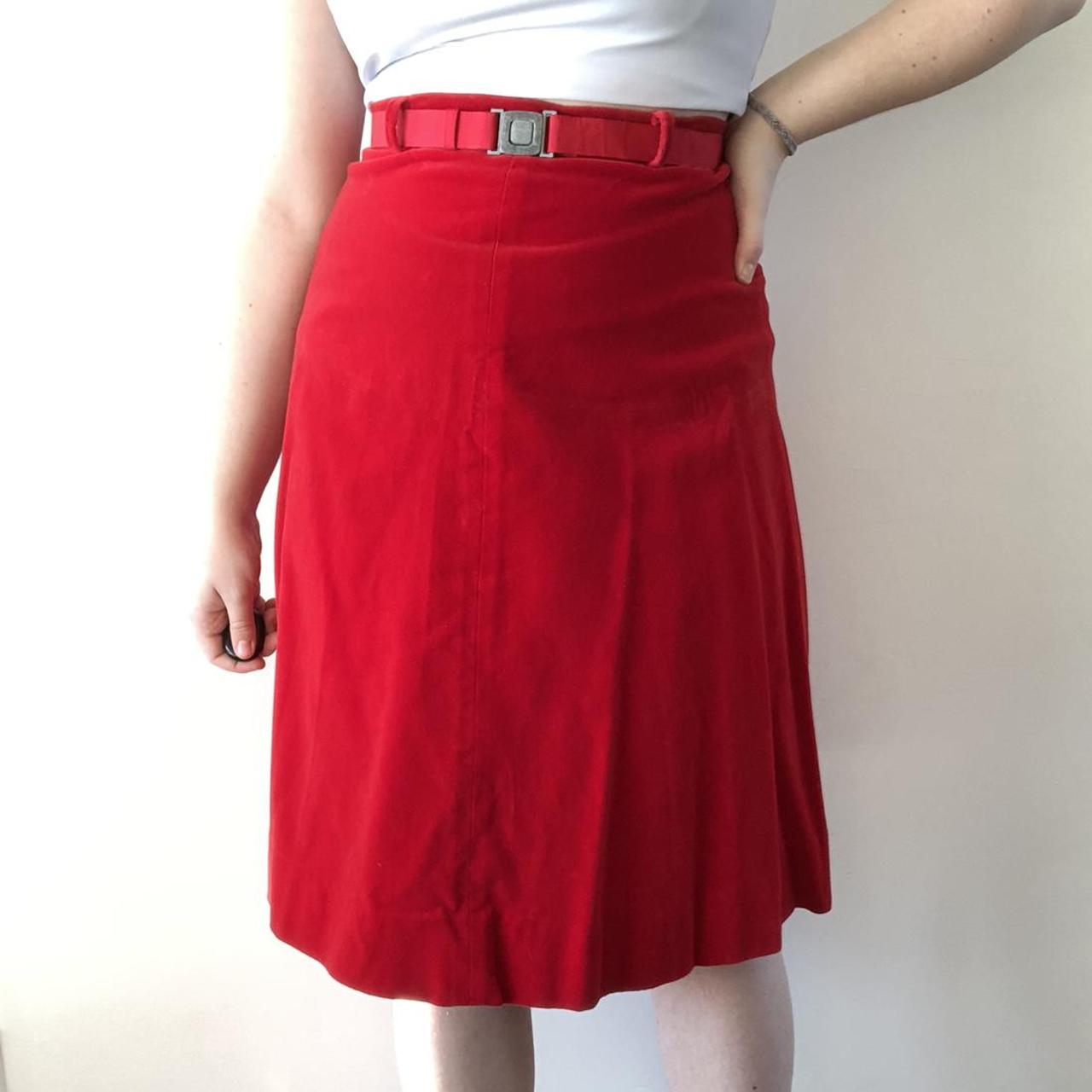 Red velvet skirt with red belt. The buckle is metal.... - Depop