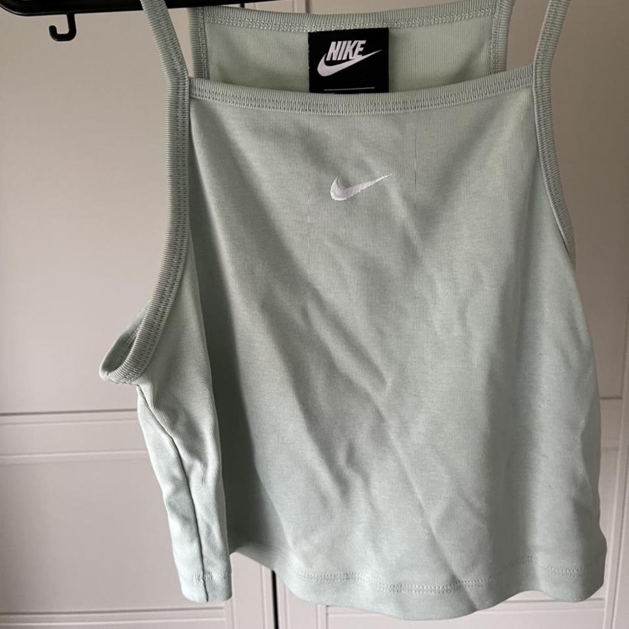 Nike mint green strappy crop top size... Depop