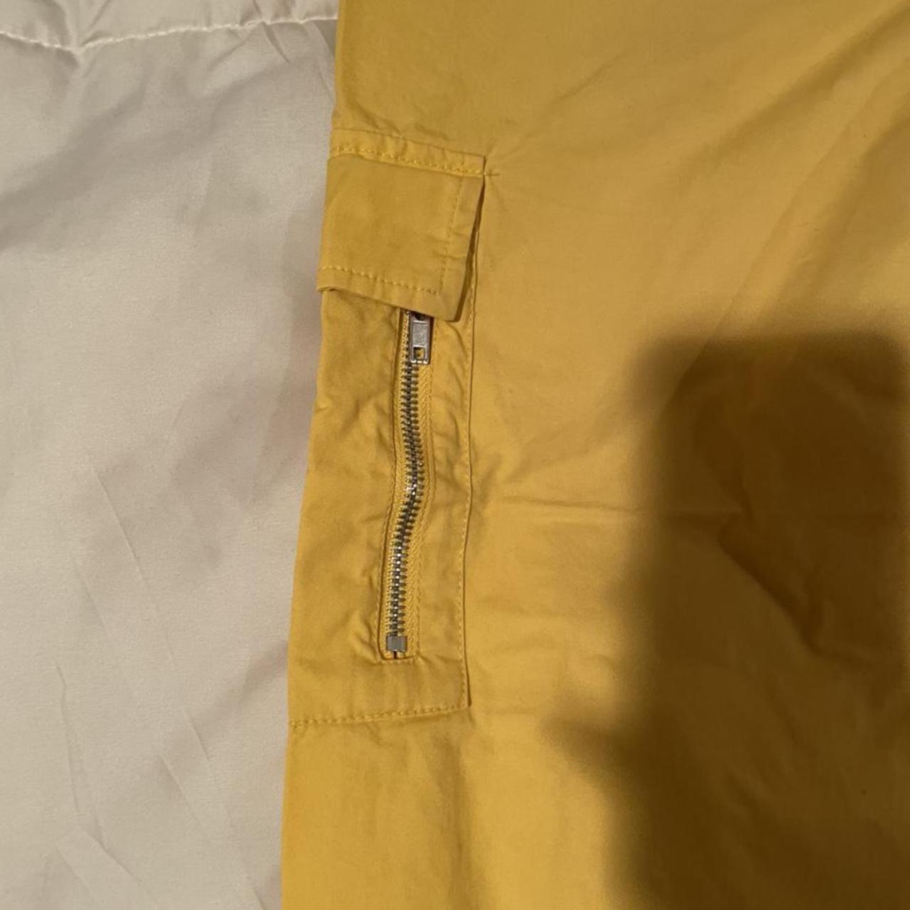 Yellow cargo pants, super cool accessory to spice up... - Depop