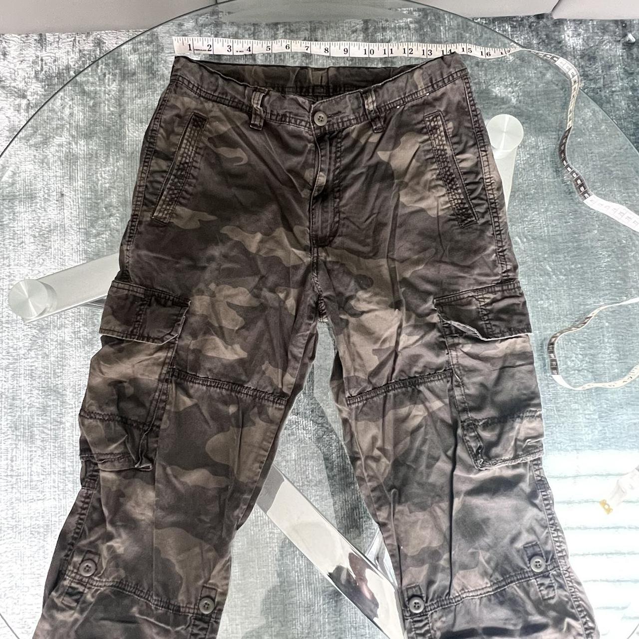 Uniqlo Camo Cargo Pants. Has drawstring waist and... Depop