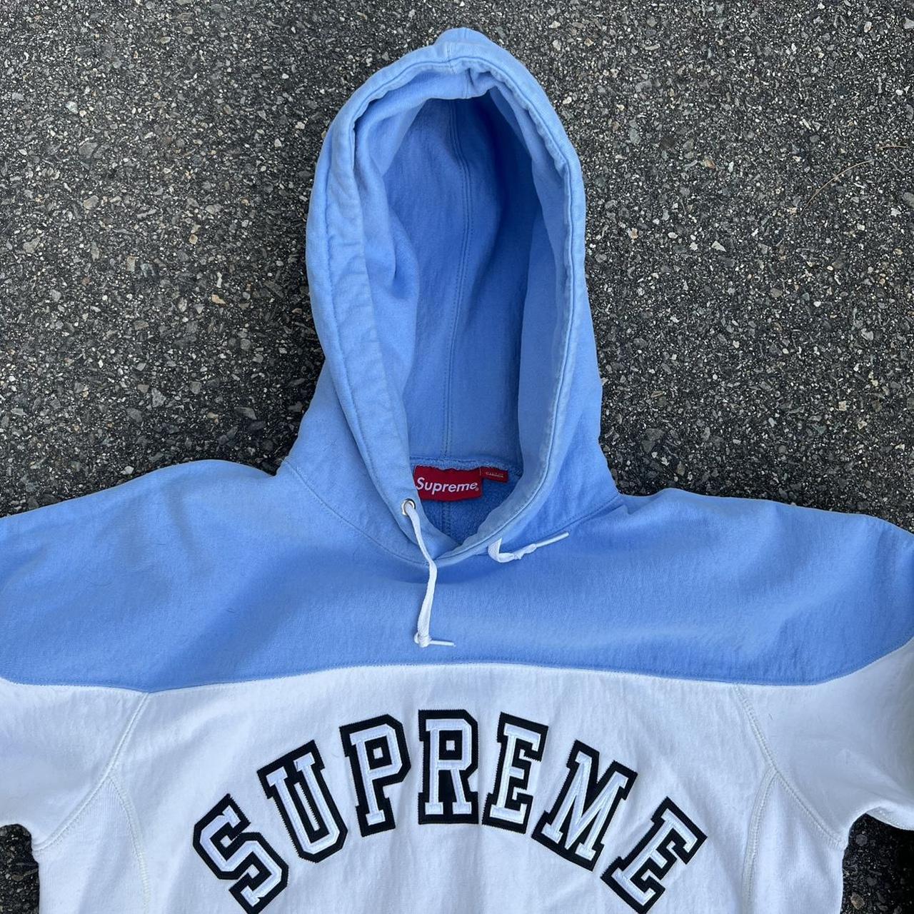 Blue and white store supreme hoodie