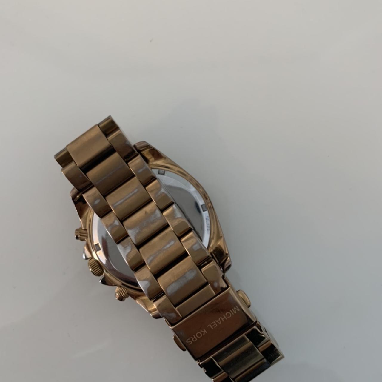 Michael kors rose gold 2024 watch fading