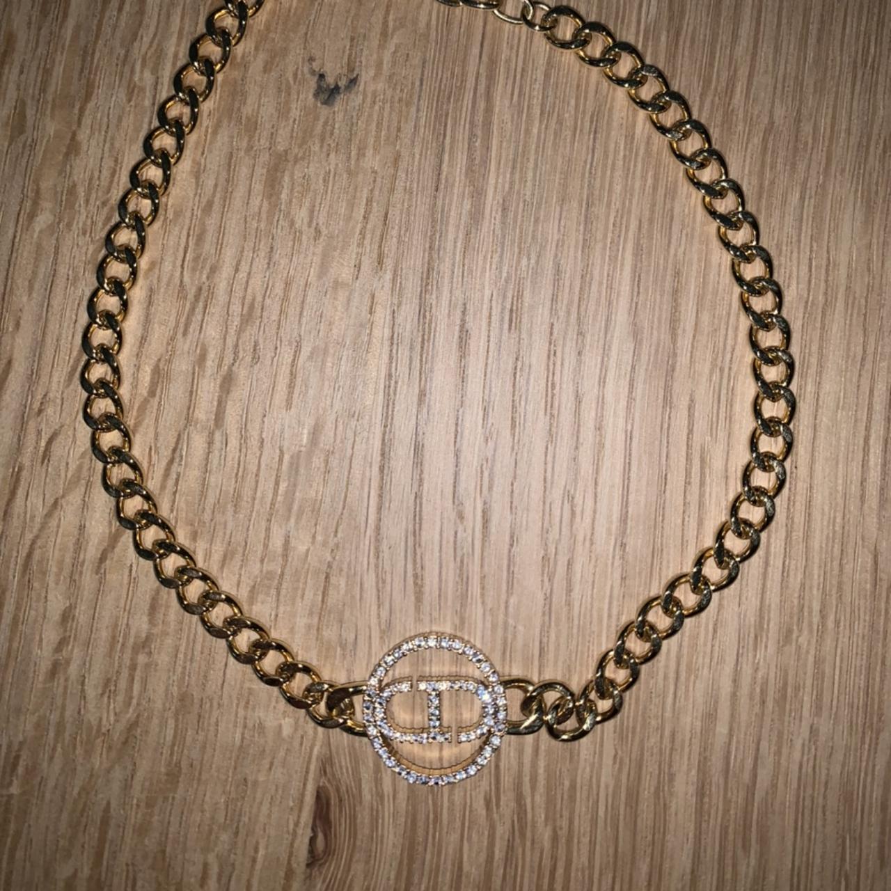 Nike Logo Pendent Comes with 22inch chain Pendent - Depop