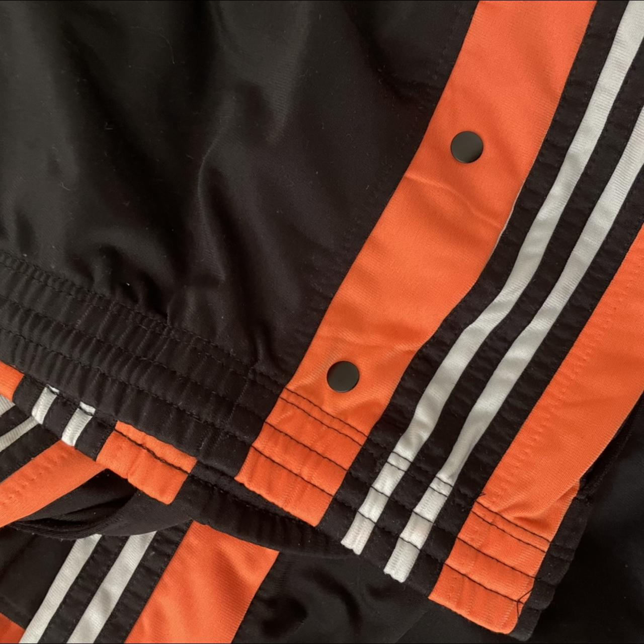 orange adidas poppers