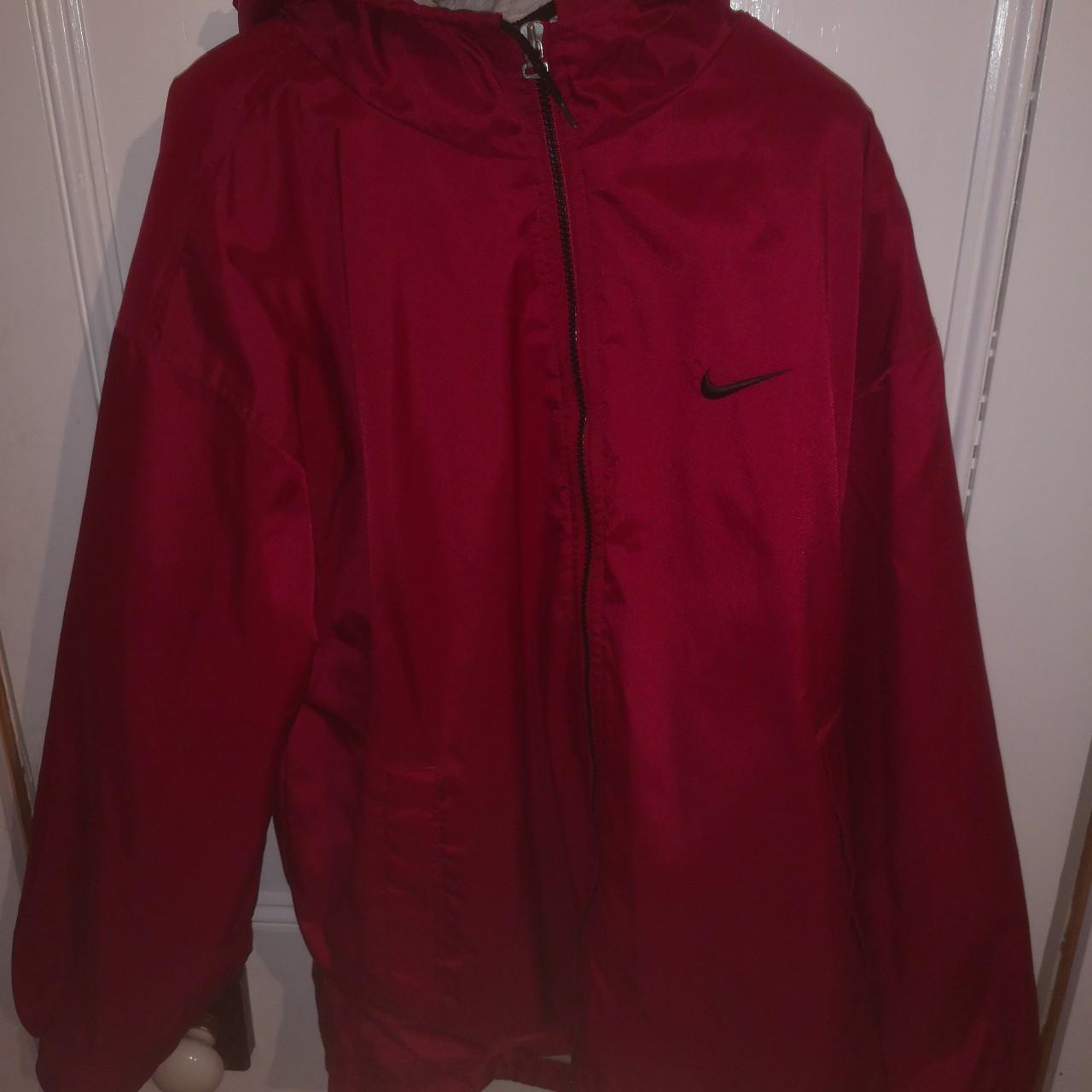 red and black nike coat