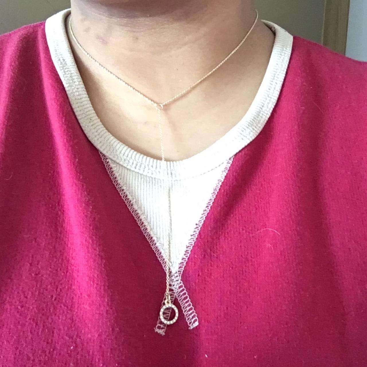 Forever 21 vline dangle circle rhinestone necklace... Depop