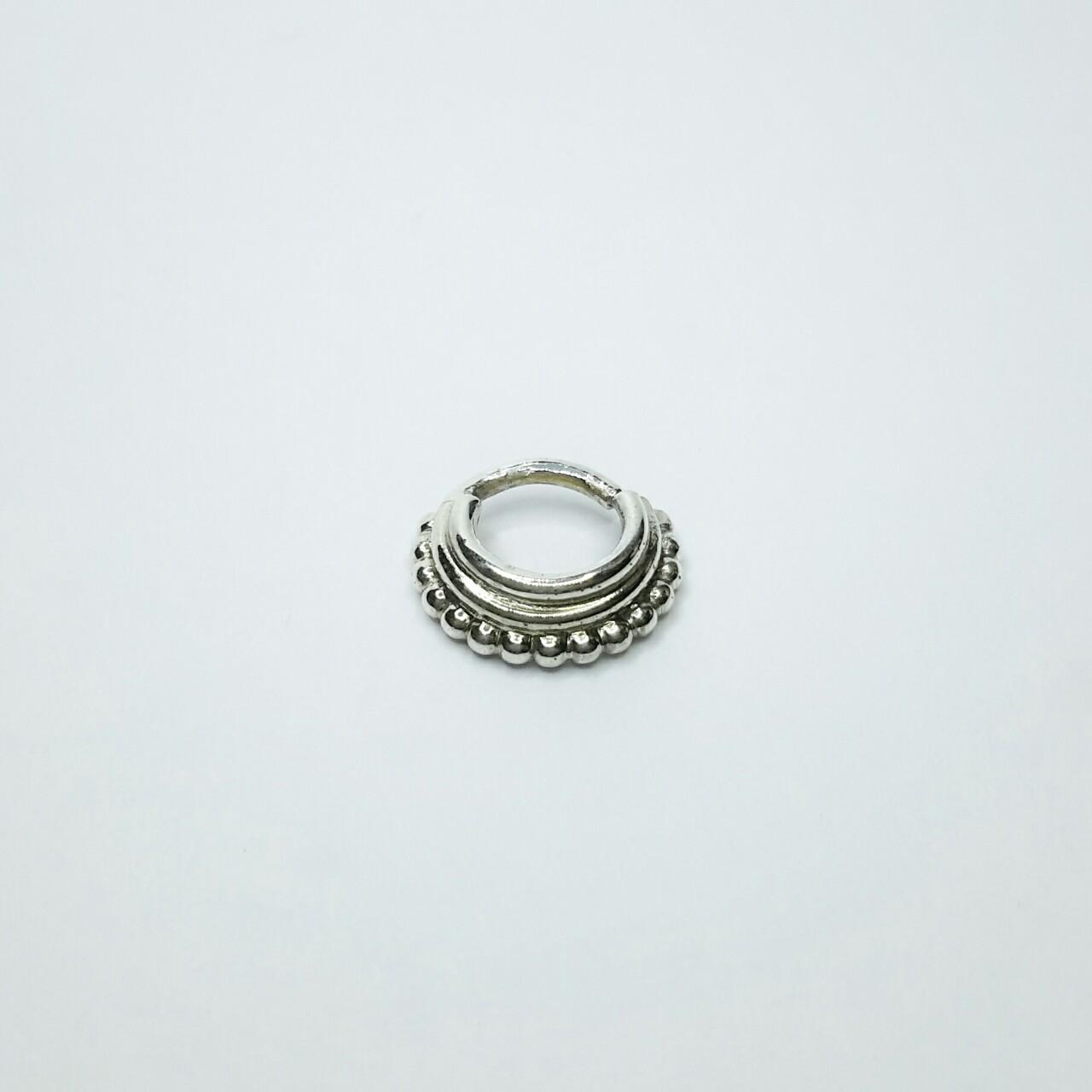 Product Image 1 - Stacked Septum Ring

Layers of polished