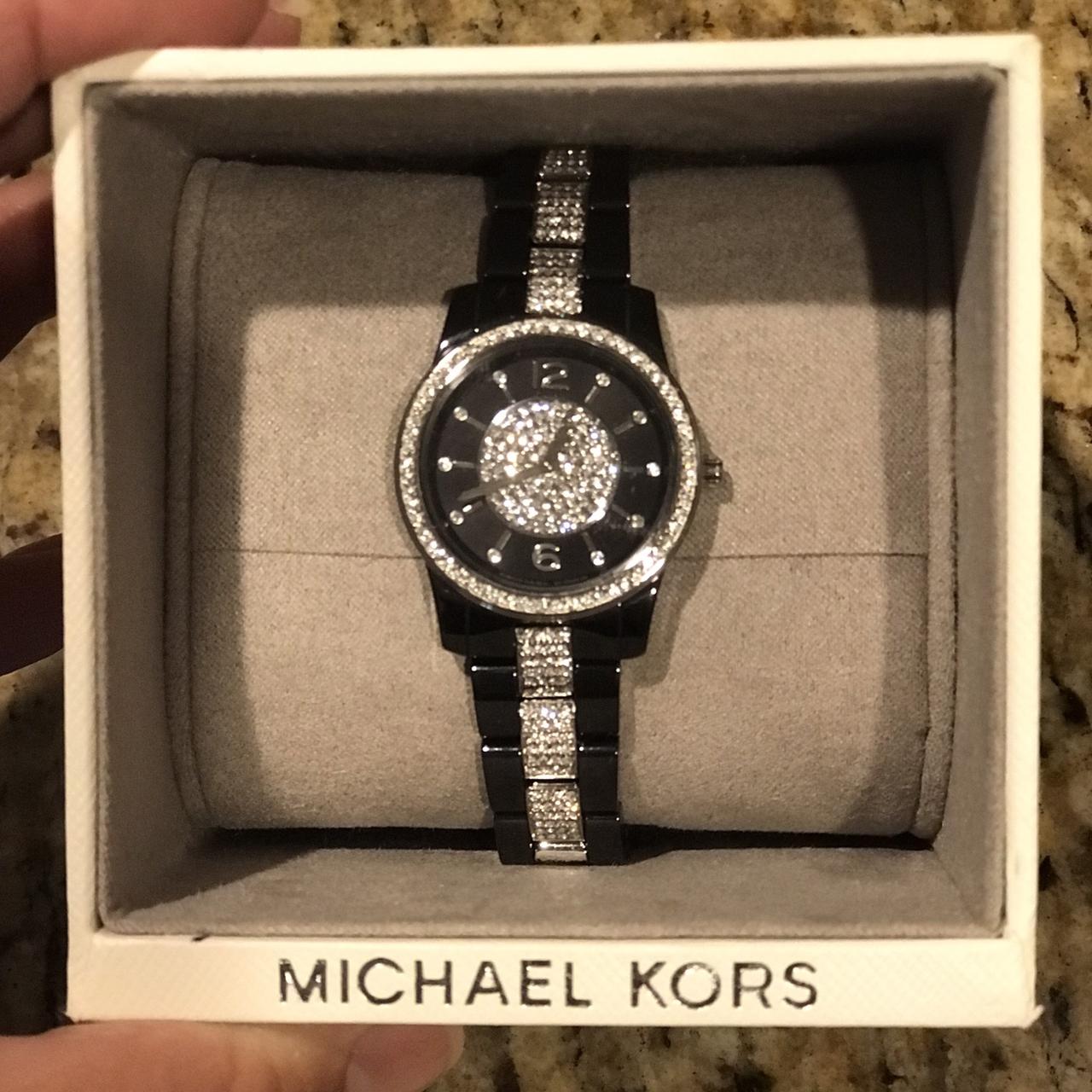 Michael Kors Black ceramic female watch Please see