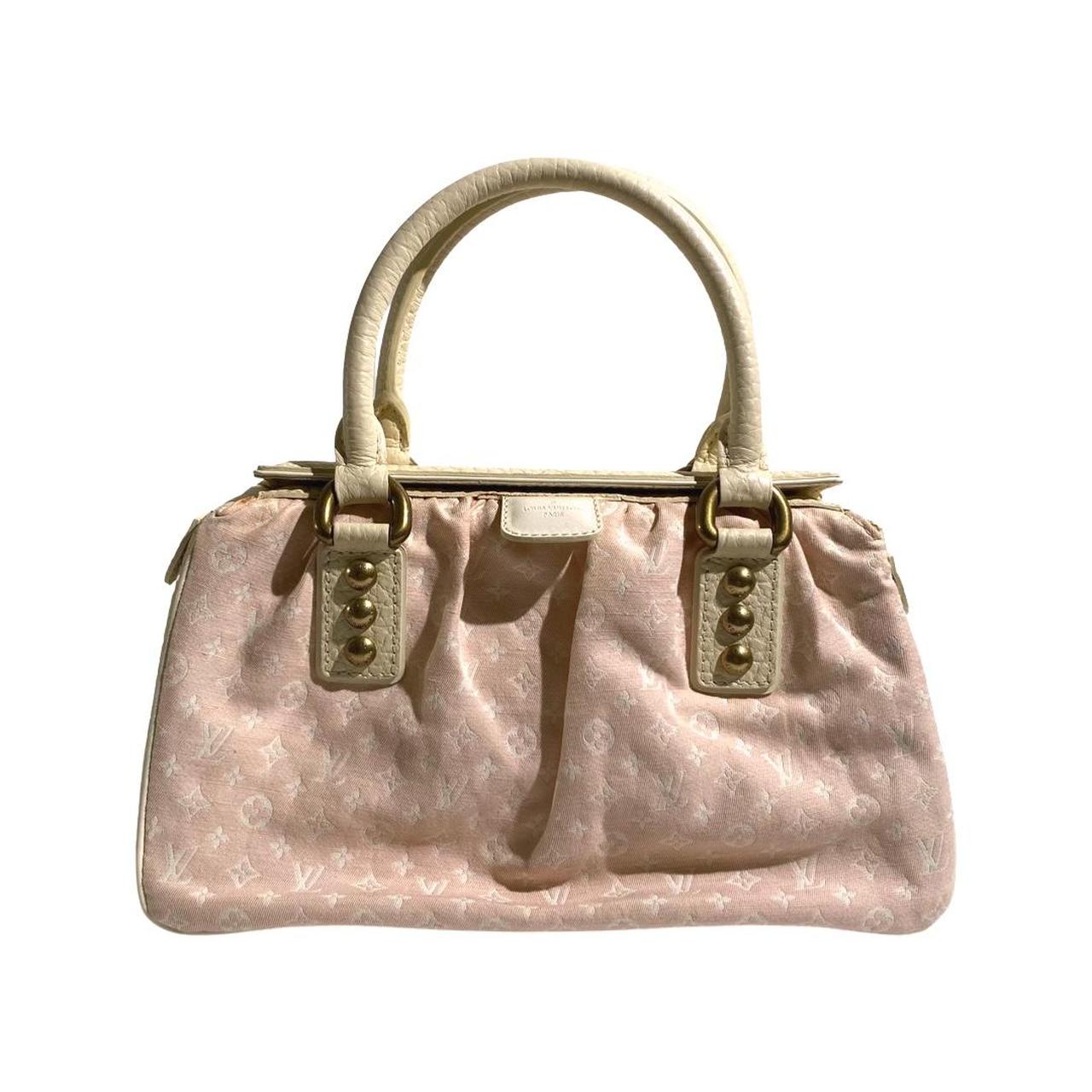Louis Vuitton mini Lin diaper bag in pink