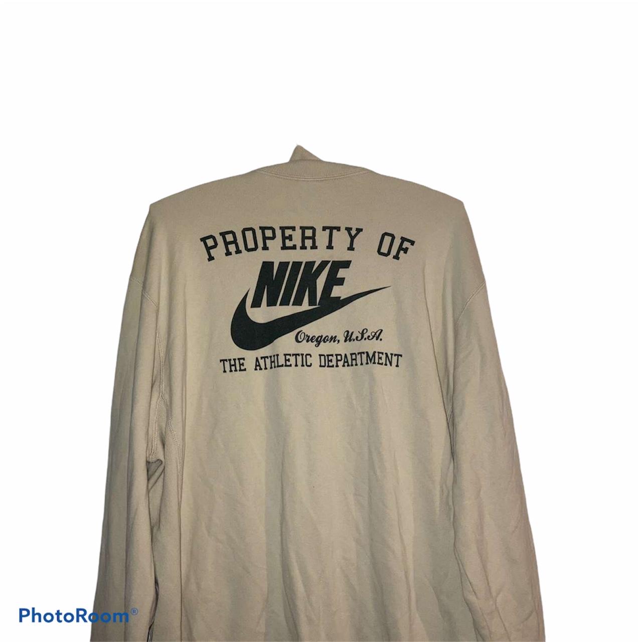 beige nike zip up