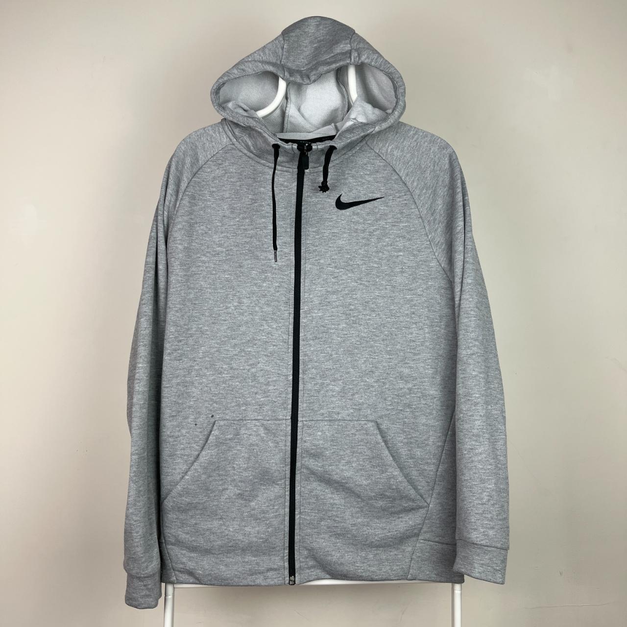Nike grey hoodie with embroidered logo on... - Depop