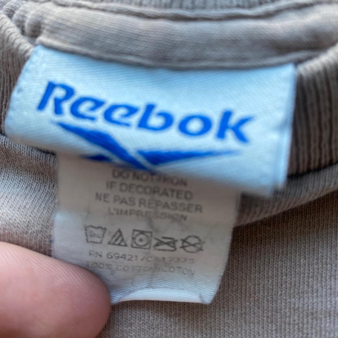 Vintage Tee. Vintage Reebok embroidered logo t... - Depop