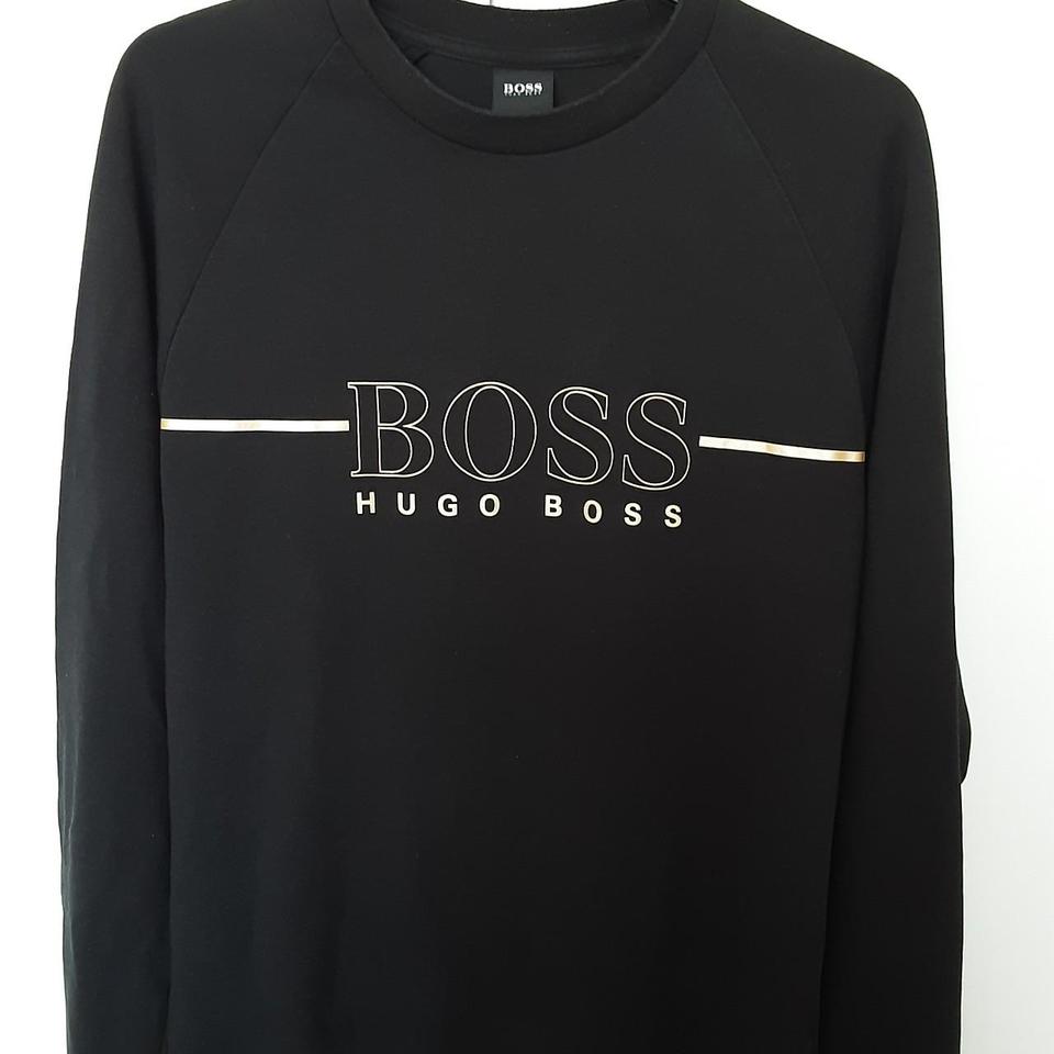 Black and gold Hugo boss jumper good condition no. Depop