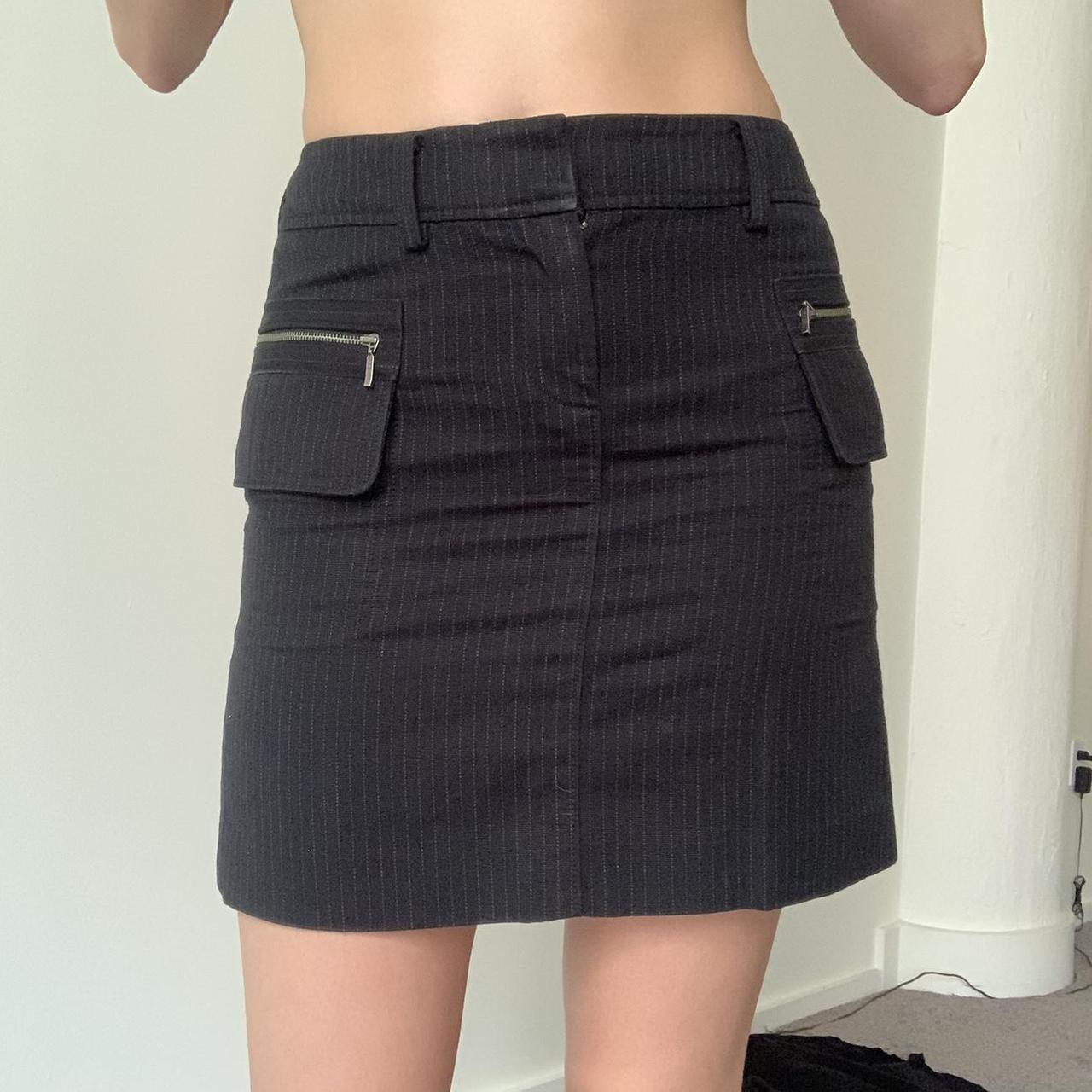 Black pinstriped denim cargo mini skirt with zipper... Depop