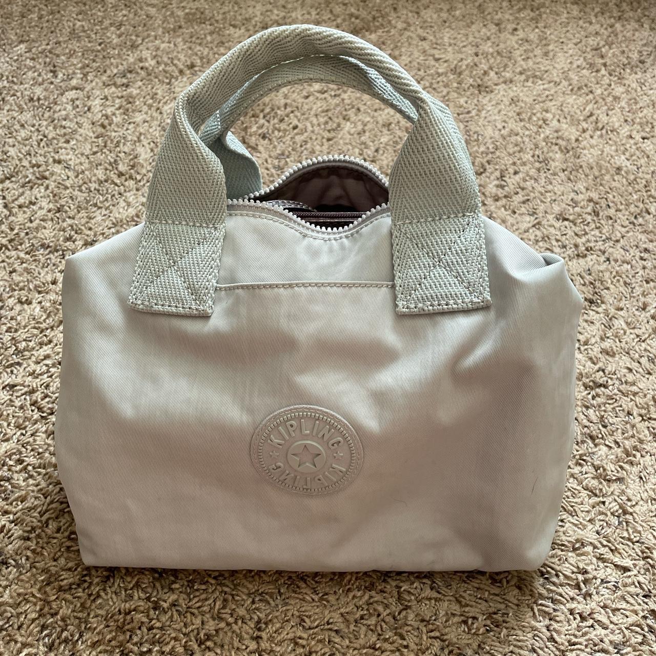 Cute casual grey Kipling bag in great condition... Depop