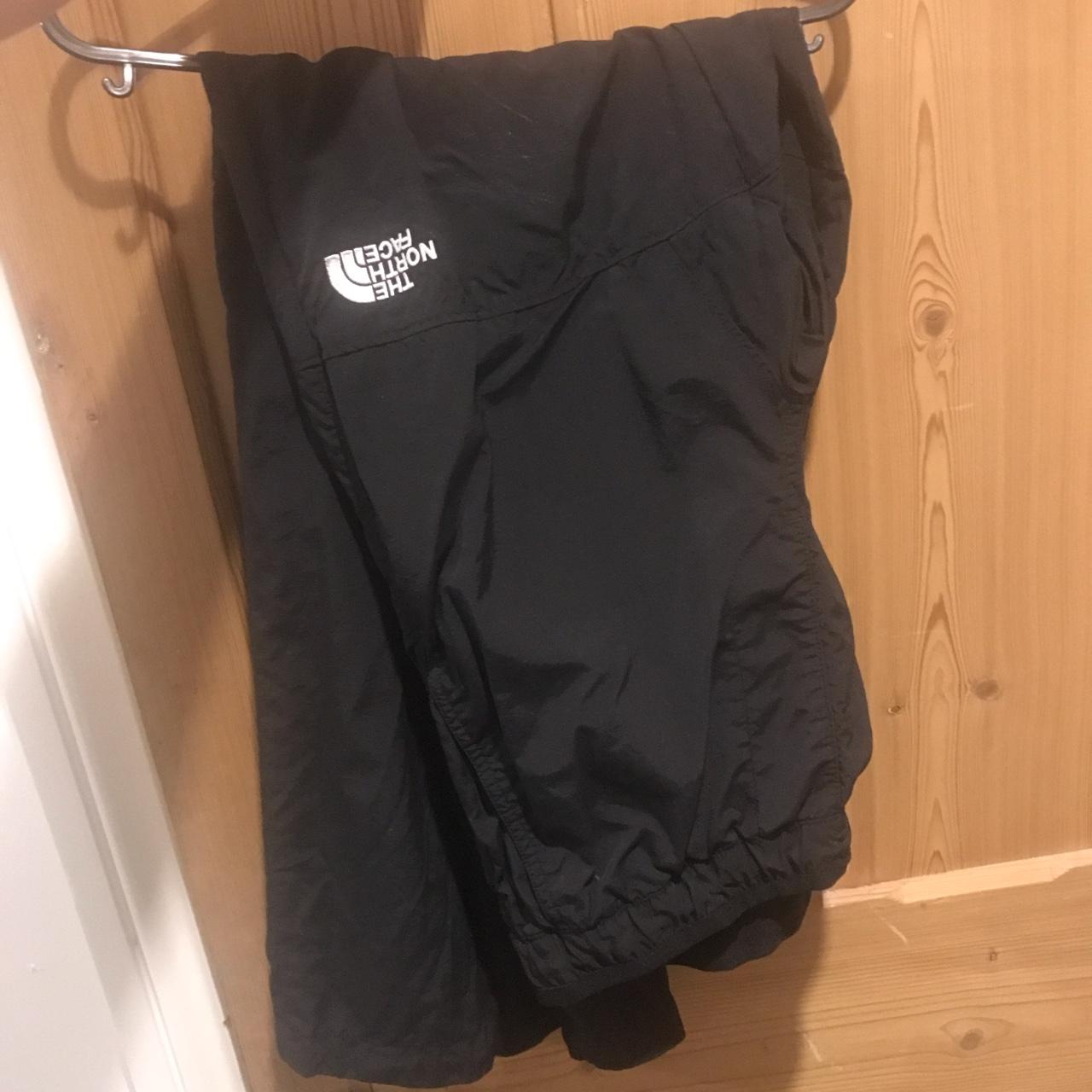 North face waterproof trackies 8/10 condition... Depop