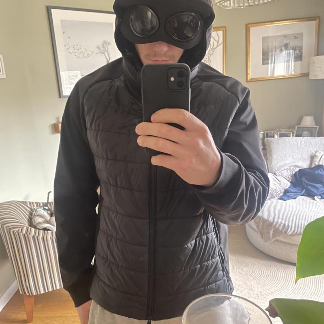 cp company puffer with goggles