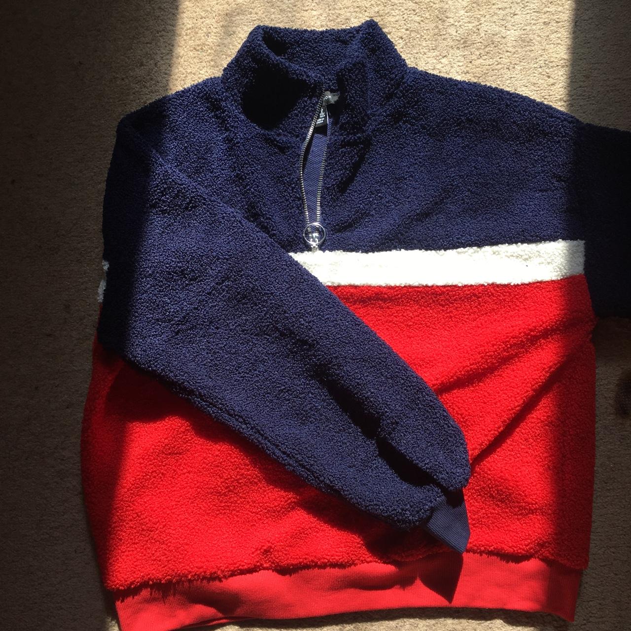 Red blue and white cotton jumper with a circle zip. Depop