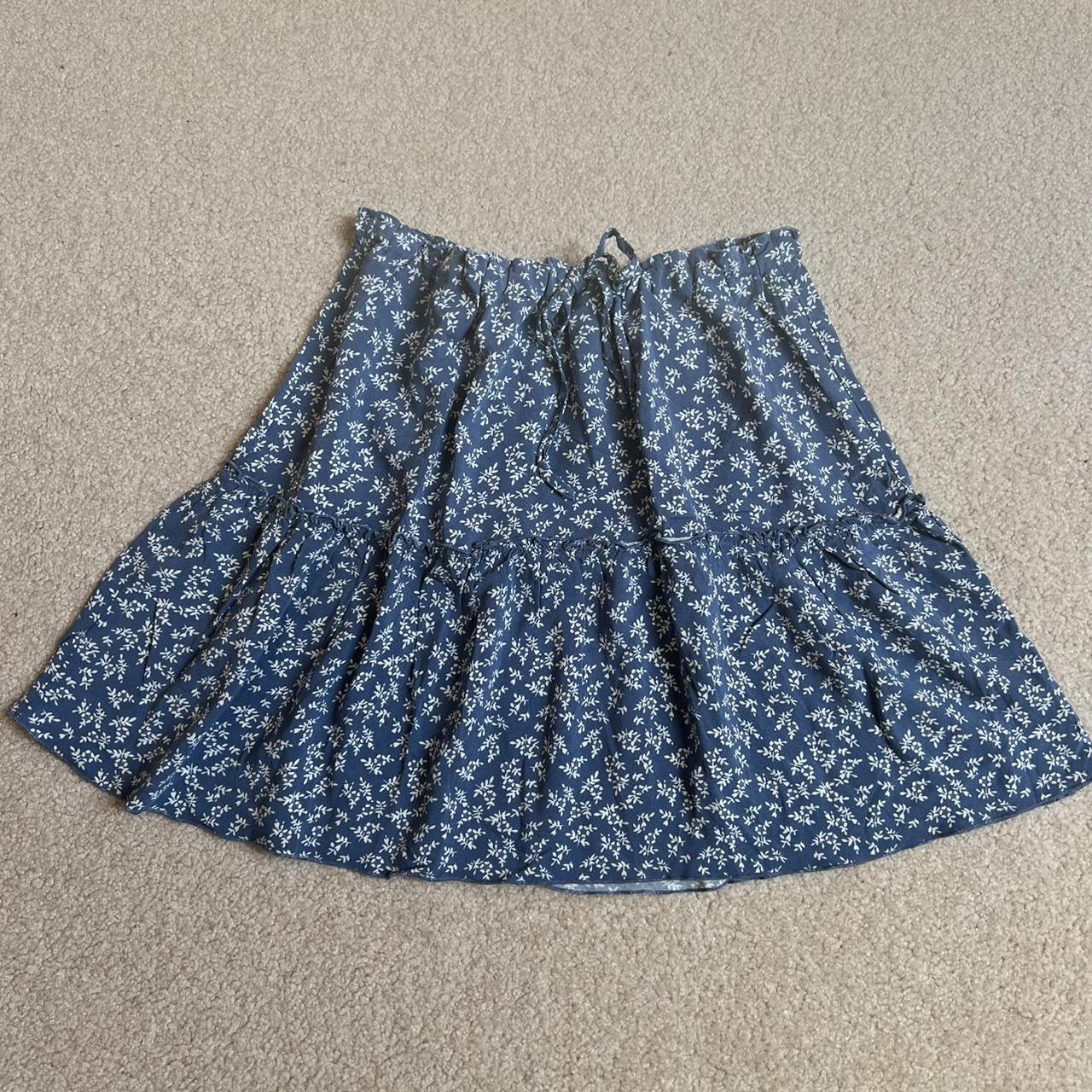 NWT blue and white floral brandy melville mini skirt... - Depop