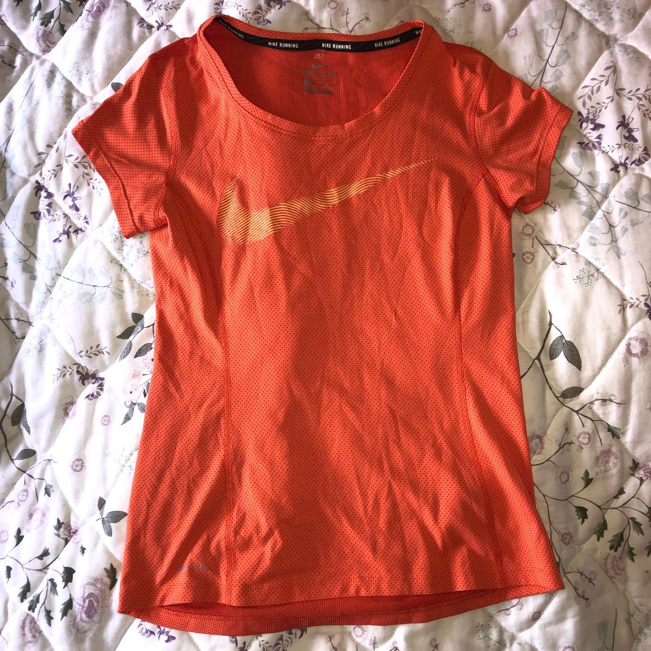 Orange Nike Dri-Fit Orioles t-shirt. The size is an - Depop