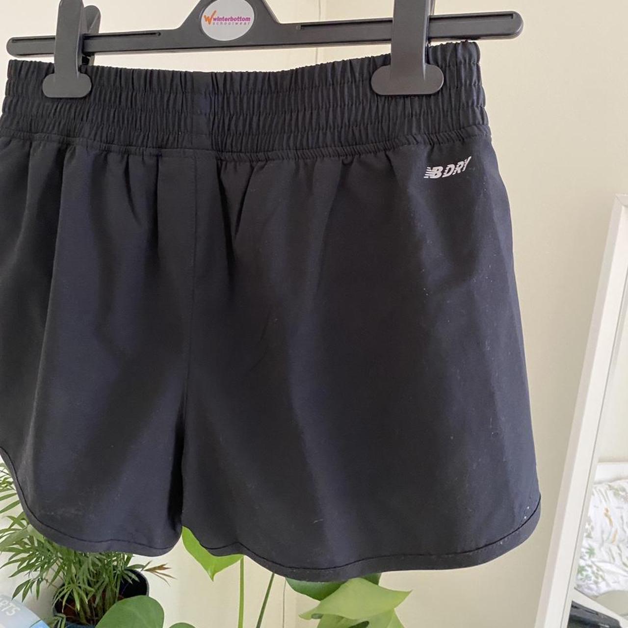 New Balance dry running/ sports shorts in black -... - Depop