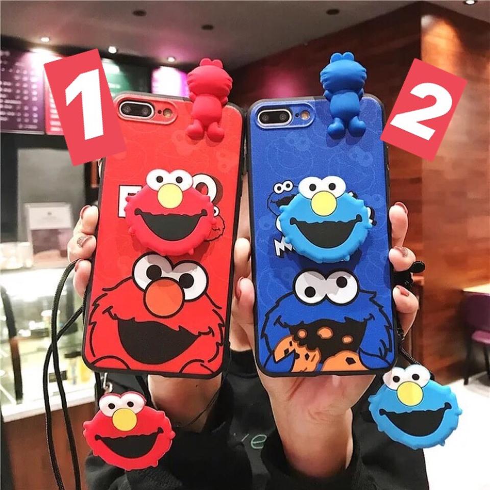 Cookie Monster and Elmo cases with accessories Depop