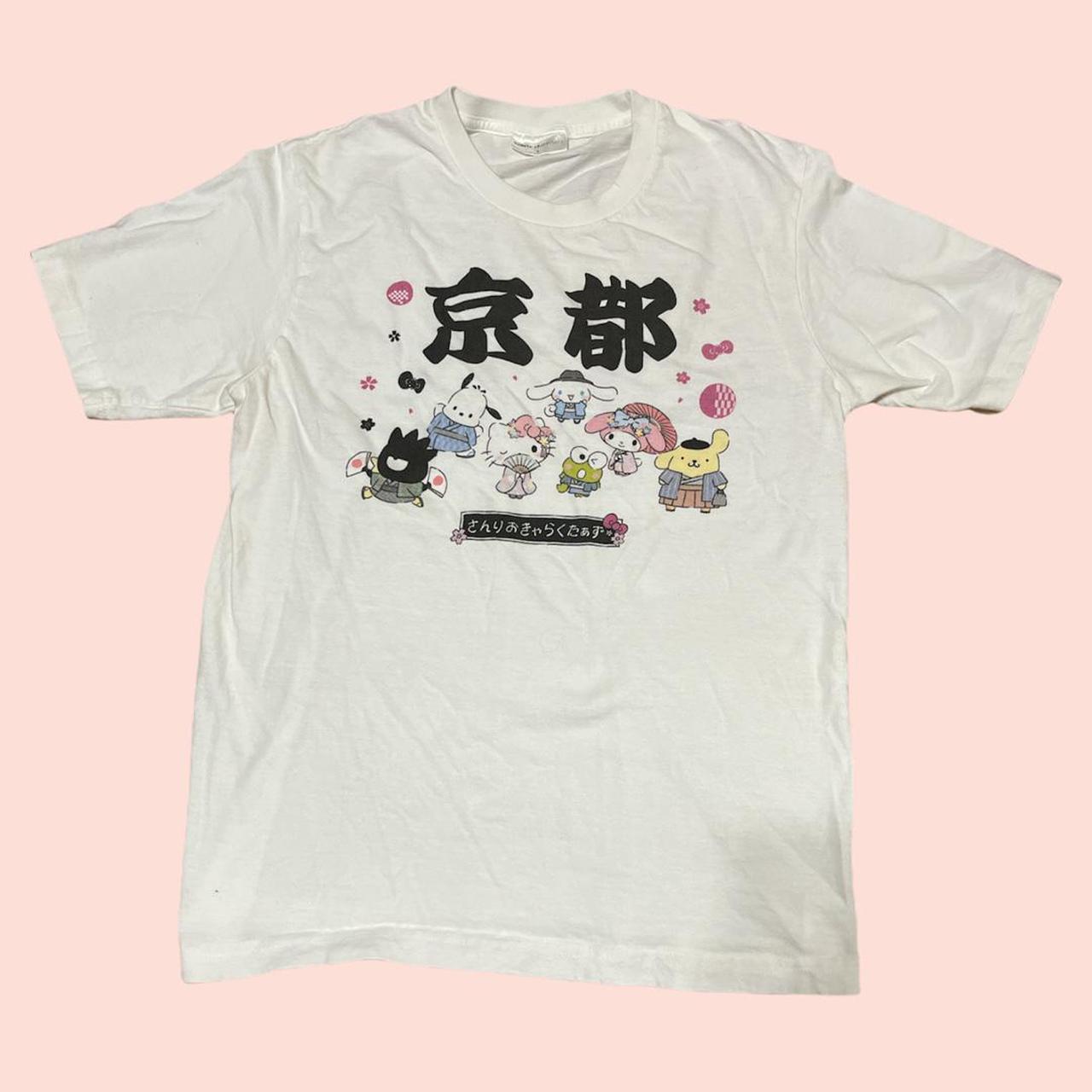 white Hello Kitty design t-shirt with four tiny - Depop