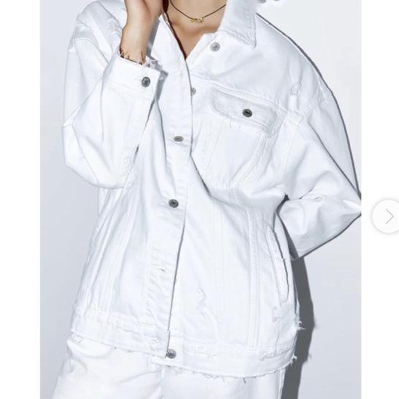 white ripped jacket