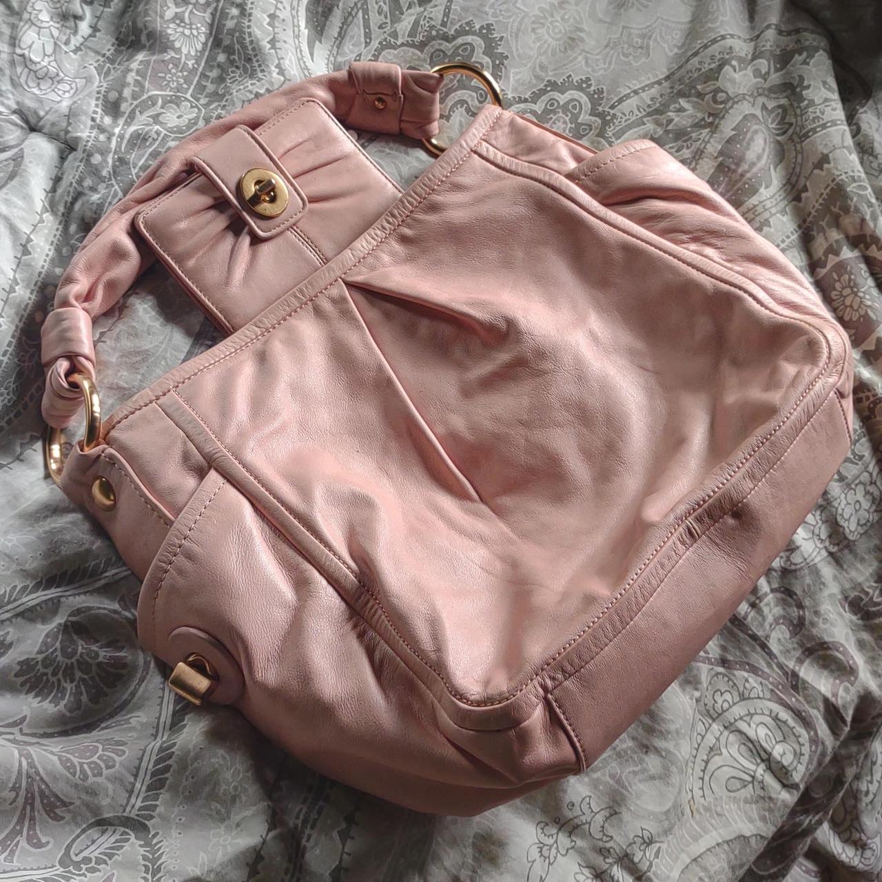 pink coach bag inside｜TikTok Search
