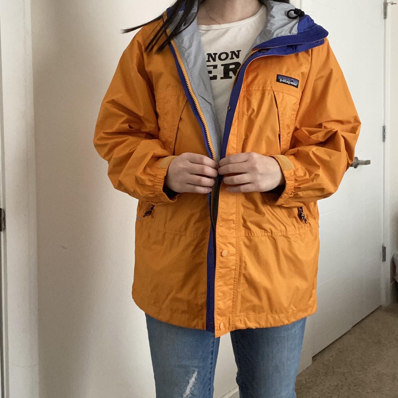 Orange Patagonia windbreaker jacket with blue | Depop