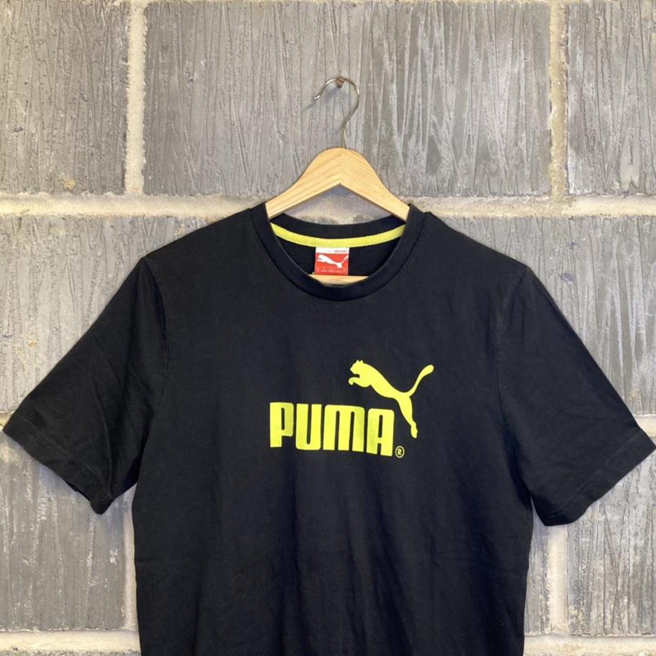 Black Puma T shirt Yellow printed spell out Size. Depop