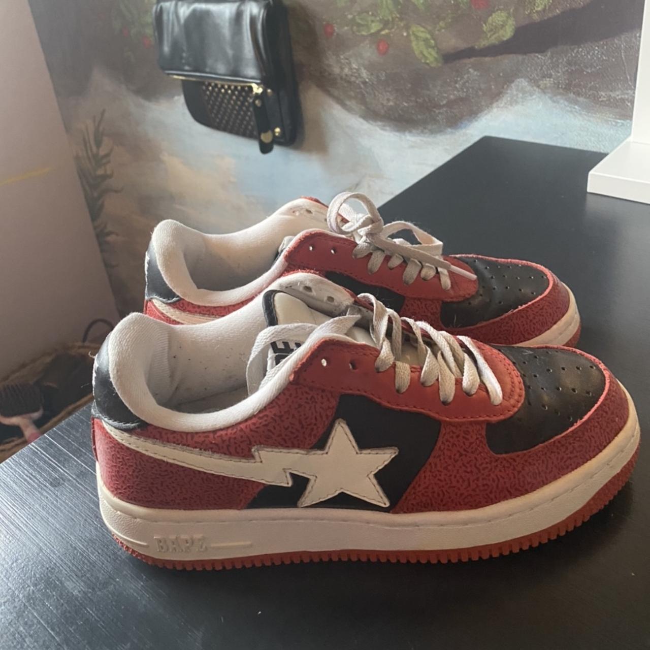 red and black bapestas, they’re a little worn in
