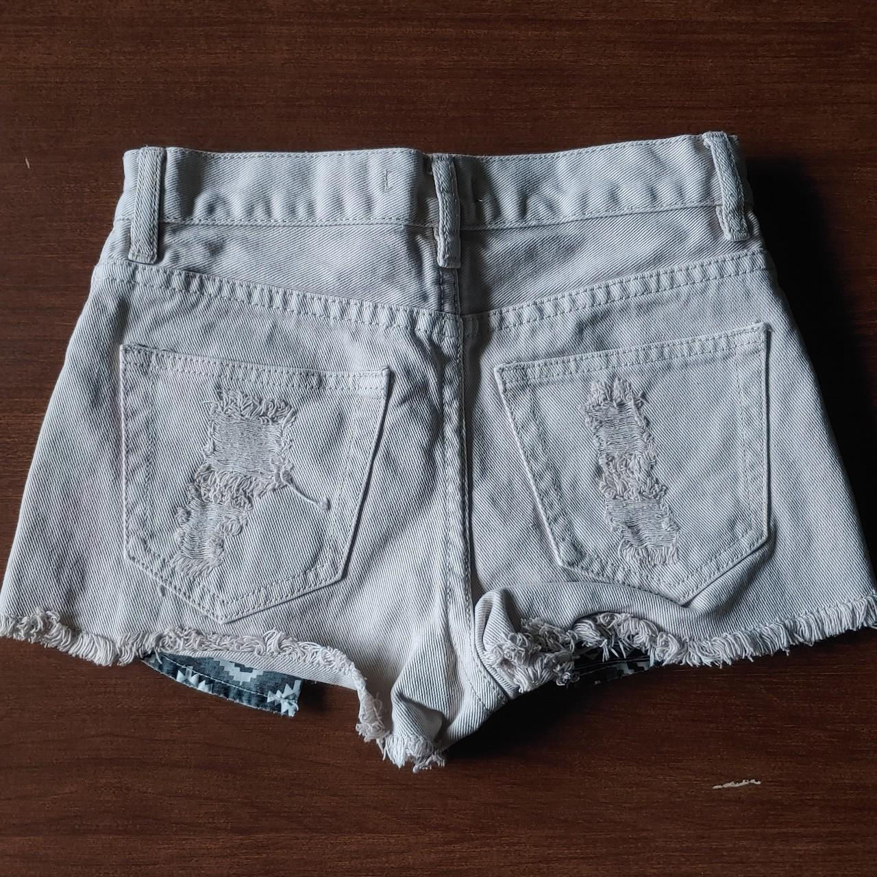 Offwhite cream colored distressed denim shorts with... Depop