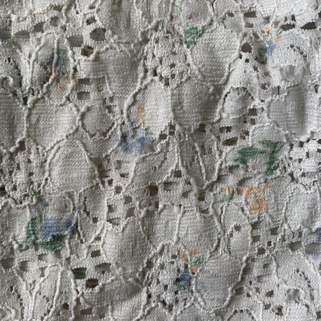 White floral lace bodysuit with a cute multicolour... Depop