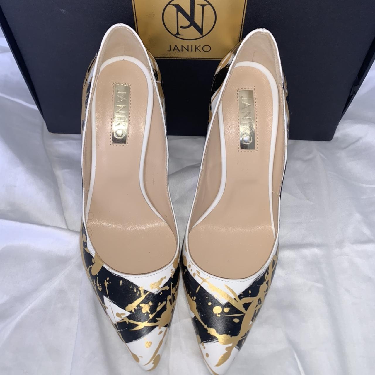 Iconic sales gold heels