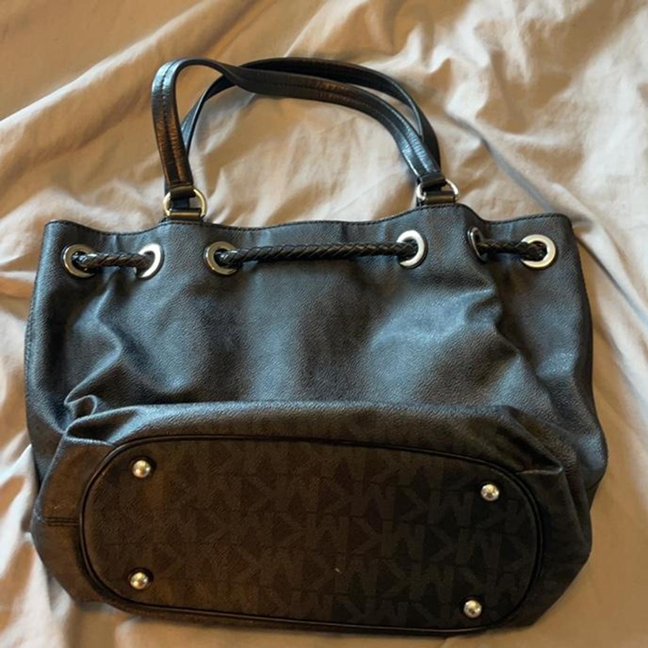 Michael Kors Black and Silver Purse. Used but in... Depop